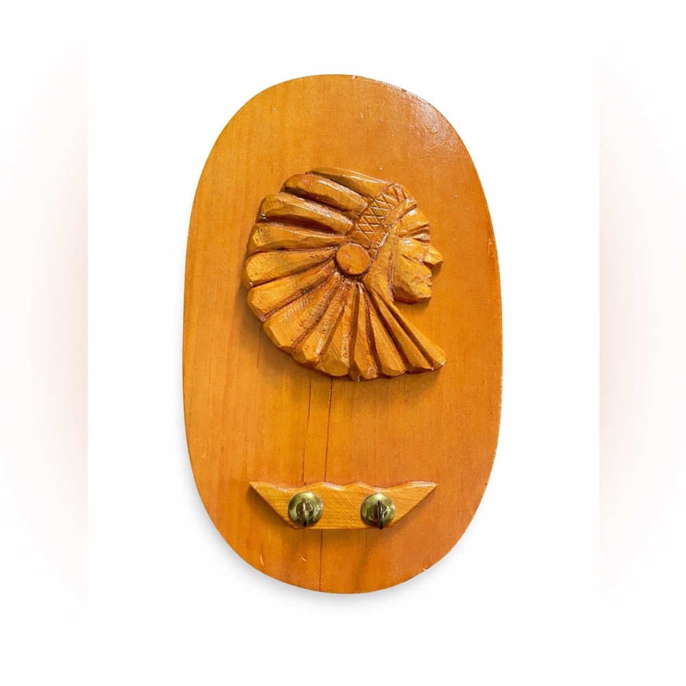 Handcrafted Wooden Wall Hook with Carved Headdress in Warm Honey
